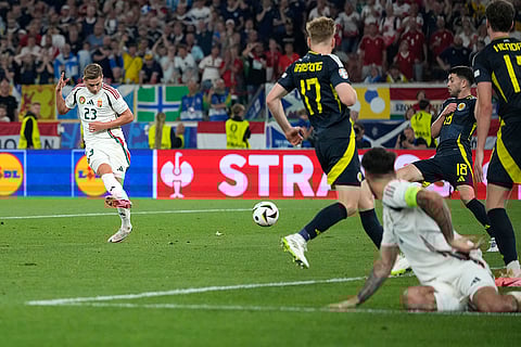 Hungary's Kevin Csoboth scores a goal